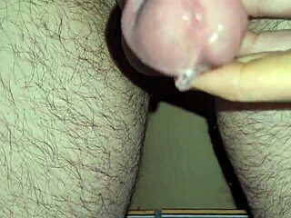 shimmering precum erupts into thick ropes of hot cum explosion