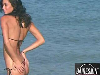 Jessica sways sensually in bikini teasing erotic beach moves