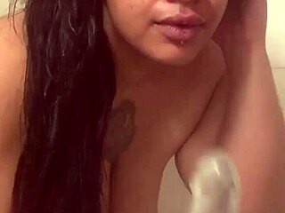 Fresh Face Fucks Herself Hard In Steamy Shower