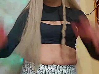 Hot ladyboy transsexual strokes cock hard while teasing with her shemale curves and crossdressing outfit