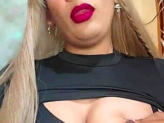 Hot ladyboy transsexual strokes cock hard while teasing with her shemale curves and crossdressing outfit