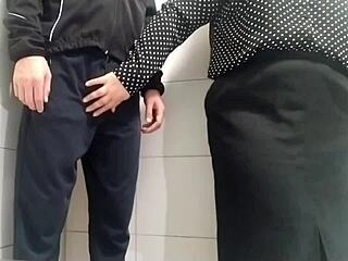 Gorgeous Milf Sneaks Handjob Thrill In Public Toilet Stall