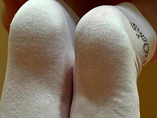 wet hairy pussy soaks nylon tights then pees on white socks