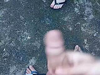 pretty brunette gives wet public backyard blowjob in garden