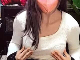 Watch! Masked beauty crossdresses as shemale jerks off on cam!