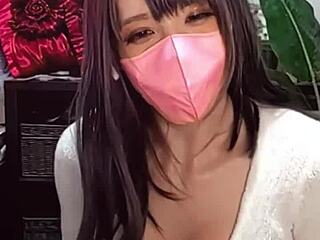 Watch! Masked beauty crossdresses as shemale jerks off on cam!