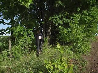 Watch This Sexy Milf Tease in Ripped Leather Leggings Outdoor Yoga Flashing Tight Ass!