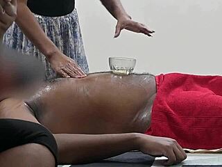 flashing my throbbing cock to the hot massage lady while she strokes it out
