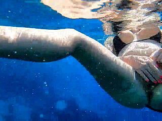 hot milf enjoys underwater cowgirl ride on huge cock in pool with juicy pussy