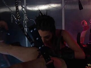 busty brunette slut ties up chained dude and rides him with strapon while her friend watches