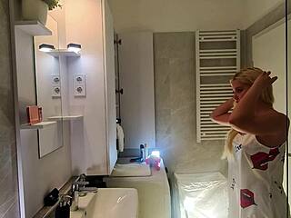 sexy blonde college girl strips satin nightie in bathroom teasing her curves