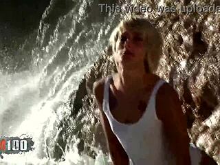 Petite French blonde strips naked right on the beach for you