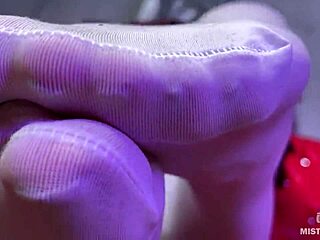 Goddess Flaunts Massive Booty and Long Legs in White Stockings Teasing on Red Couch