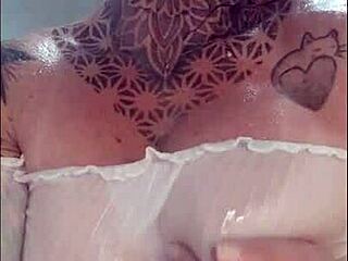 Redhead bombshell showers her big ass and clit for webcam fans