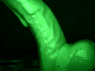 latex gloved tease delivers sticky slimy dildo handjob all over.