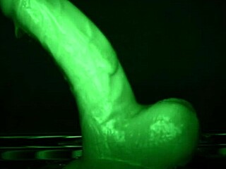 latex gloved tease delivers sticky slimy dildo handjob all over.