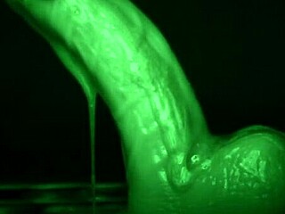 latex gloved tease delivers sticky slimy dildo handjob all over.