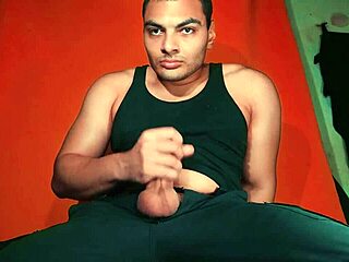 sexy chinese bodybuilder strokes monster cock on yamaha guitar in carrot glow