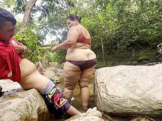 so this unknown latina pulls me to the river for a wet handjob then squeezes milk from her huge tits all over
