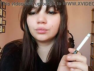 romanian femdom goddess smokes cigarette with big bare lips closeup pov