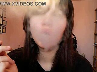 romanian femdom goddess smokes cigarette with big bare lips closeup pov
