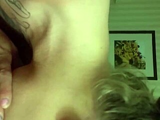 Her tattooed lips wrap perfectly around my throbbing shaft