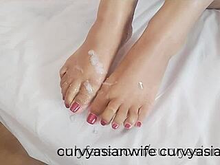 thai milf slutwife strokes cock with feet begs for hot cum load