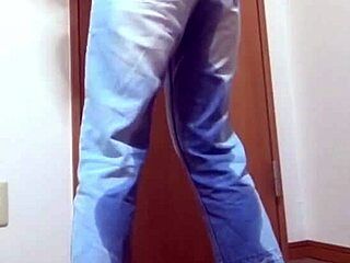 Desperate girl soaks jeans peeing while bro hogs the bathroom