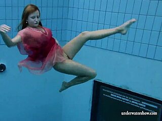 Silvie dives underwater in bikini flashing her curvy figure and natural bush
