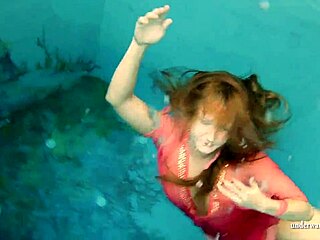 Silvie dives underwater in bikini flashing her curvy figure and natural bush