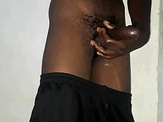 check out this kenyan stud's monster black cock getting a homemade oily handjob wank