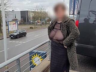 Curvy milf flashes huge saggy natural tits thru sheer top on street