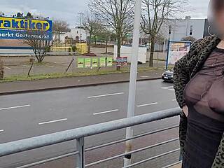 Curvy milf flashes huge saggy natural tits thru sheer top on street