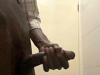 guy caught stroking cock in office bathroom
