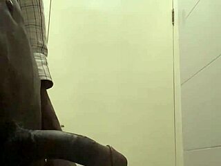 guy caught stroking cock in office bathroom