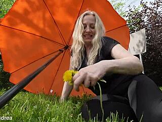Mature blonde granny fists her prolapsed wet pussy outdoors in horny solo frenzy
