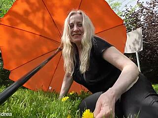 Mature blonde granny fists her prolapsed wet pussy outdoors in horny solo frenzy
