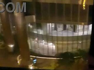naughty wife fingers her wet clit close-up in front of hotel window public orgasm thrill