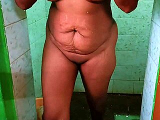Ammu bathes flashing big natural tits front back