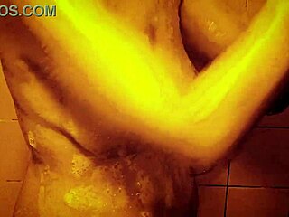 Feel the horny milf's wet nipples glisten as she massages her sexy tits in slow shower bliss.