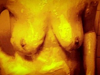 Feel the horny milf's wet nipples glisten as she massages her sexy tits in slow shower bliss.