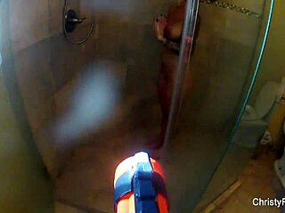 Christy Mack soaps up her big tits and ass in steamy shower