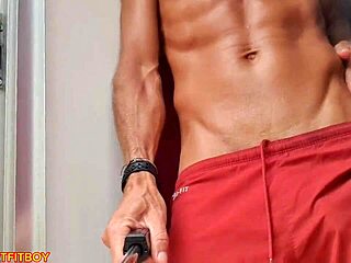 Neighbors spy as muscular guy pumps fleshlight hard then explodes cum at the open window