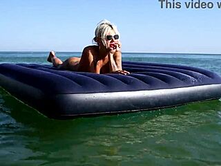 She strolls nude beach showing big tattooed boobs glasses blonde bitch public