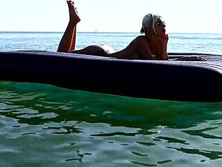 She strolls nude beach showing big tattooed boobs glasses blonde bitch public