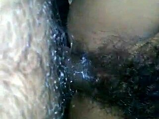 she spreads her hairy pussy wide as black cock unloads cum inside
