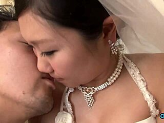 Asian bride in wedding dress fingers hairy pussy for sneaky visitor