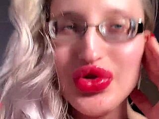 Big lips and long tongue in glossy lipstick tease your cuckold fantasies with dirty joi talk