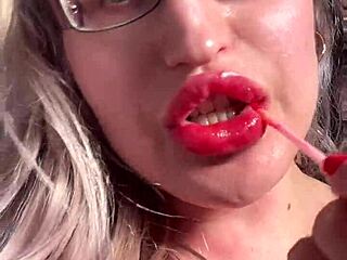 Big lips and long tongue in glossy lipstick tease your cuckold fantasies with dirty joi talk