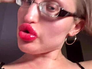 Big lips and long tongue in glossy lipstick tease your cuckold fantasies with dirty joi talk